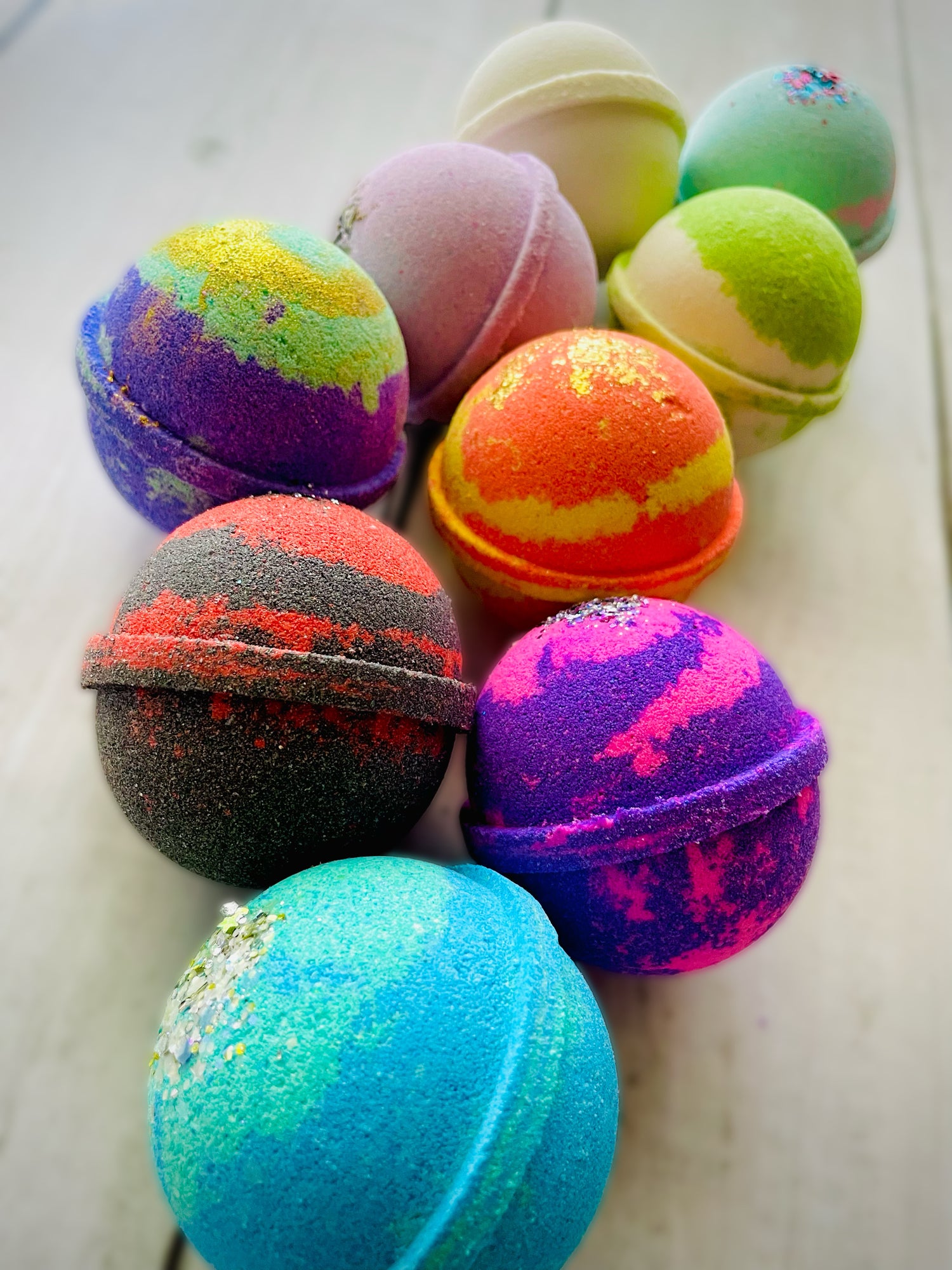 Nine bath bombs with Saturn rings.