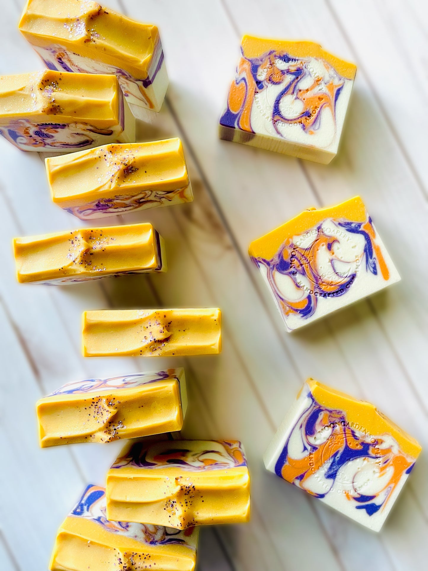Eleven bars of handmade soap.