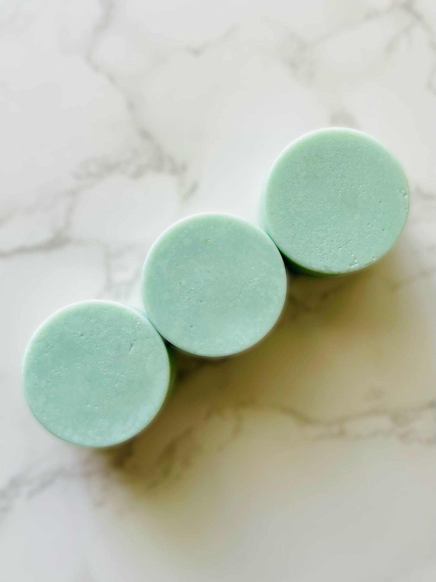 Three bars of solid conditioner.
