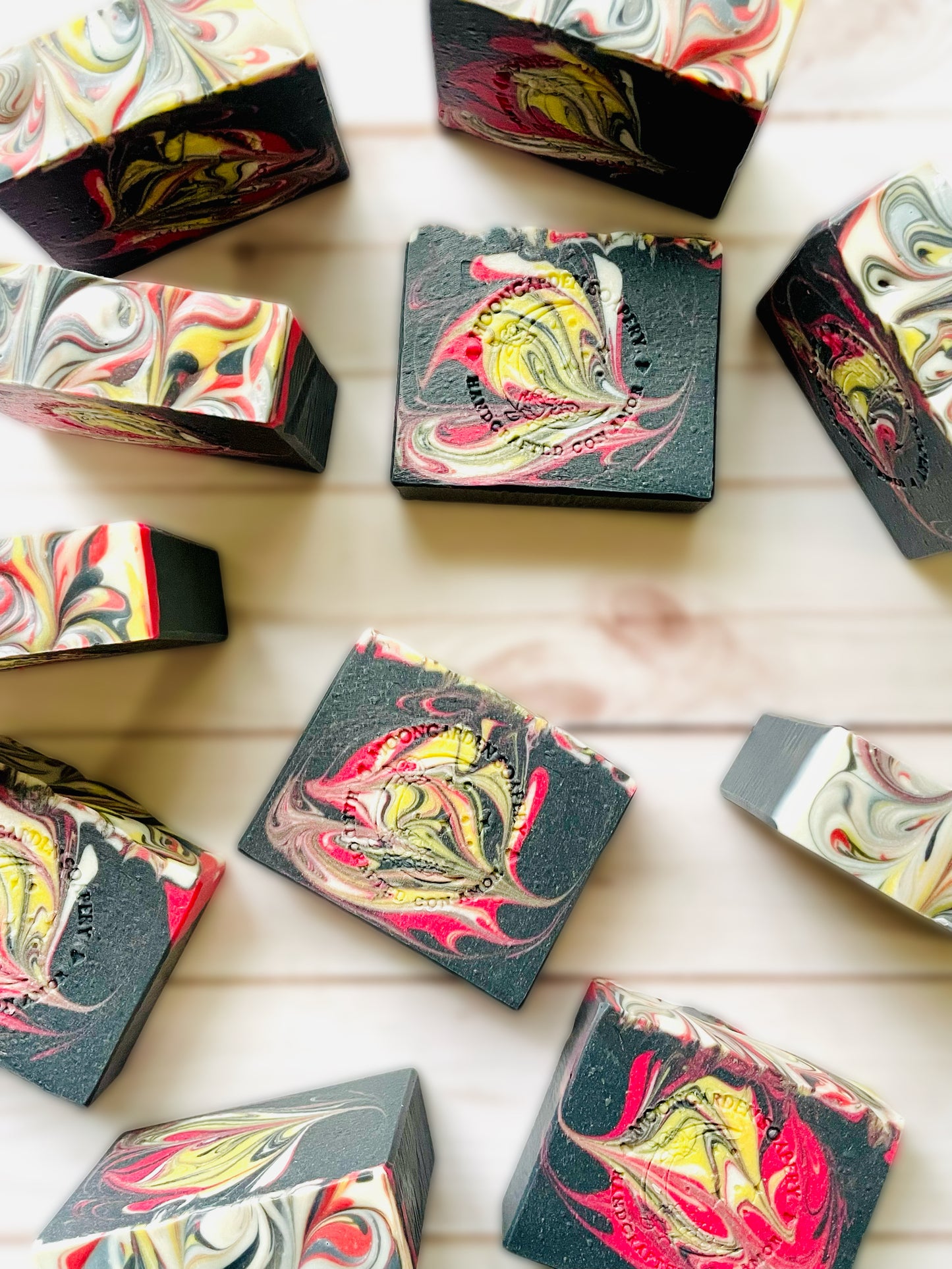 Eleven bars of handmade soap.