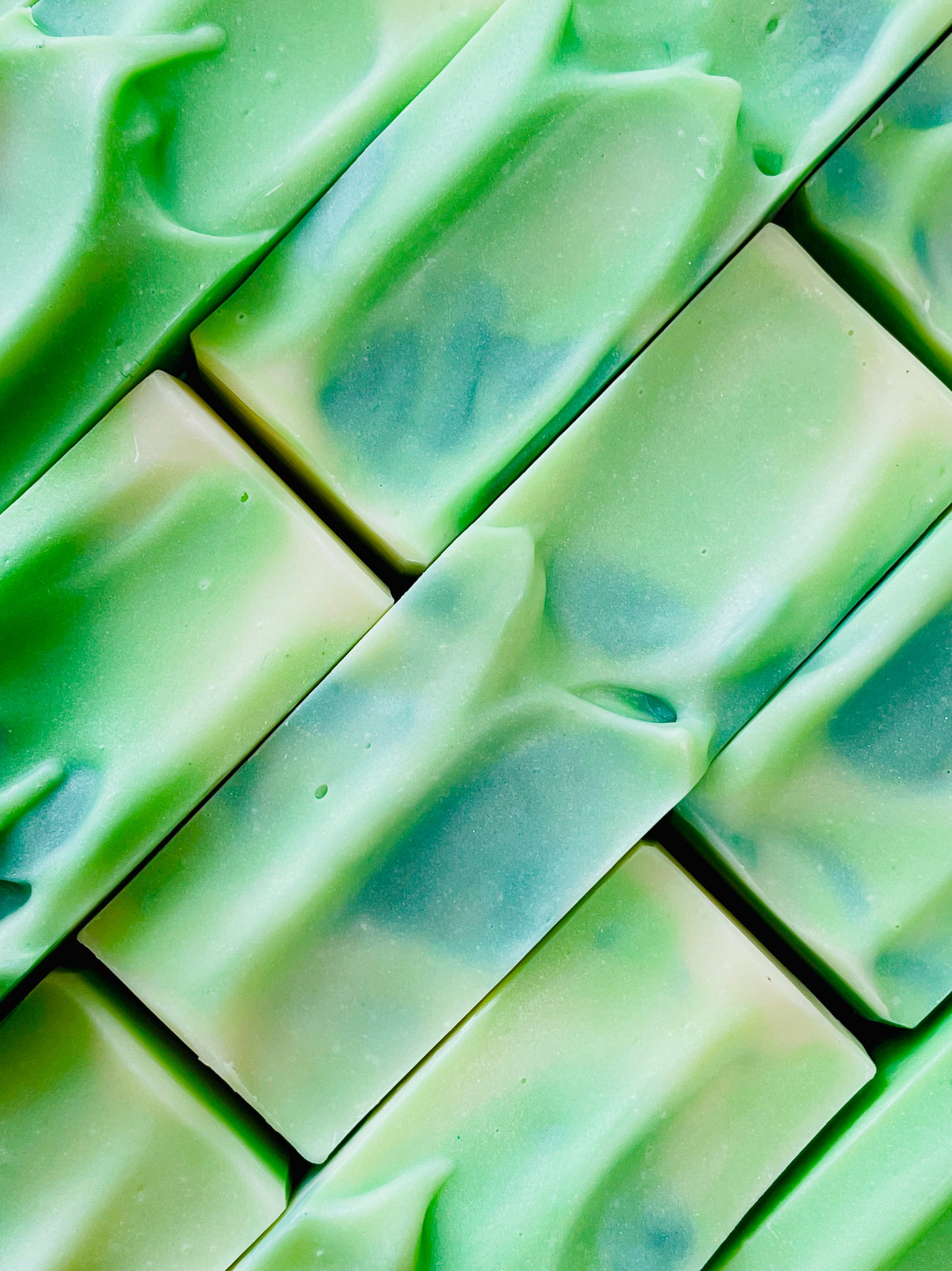 A closeup of the tops of Cool It bar soaps.