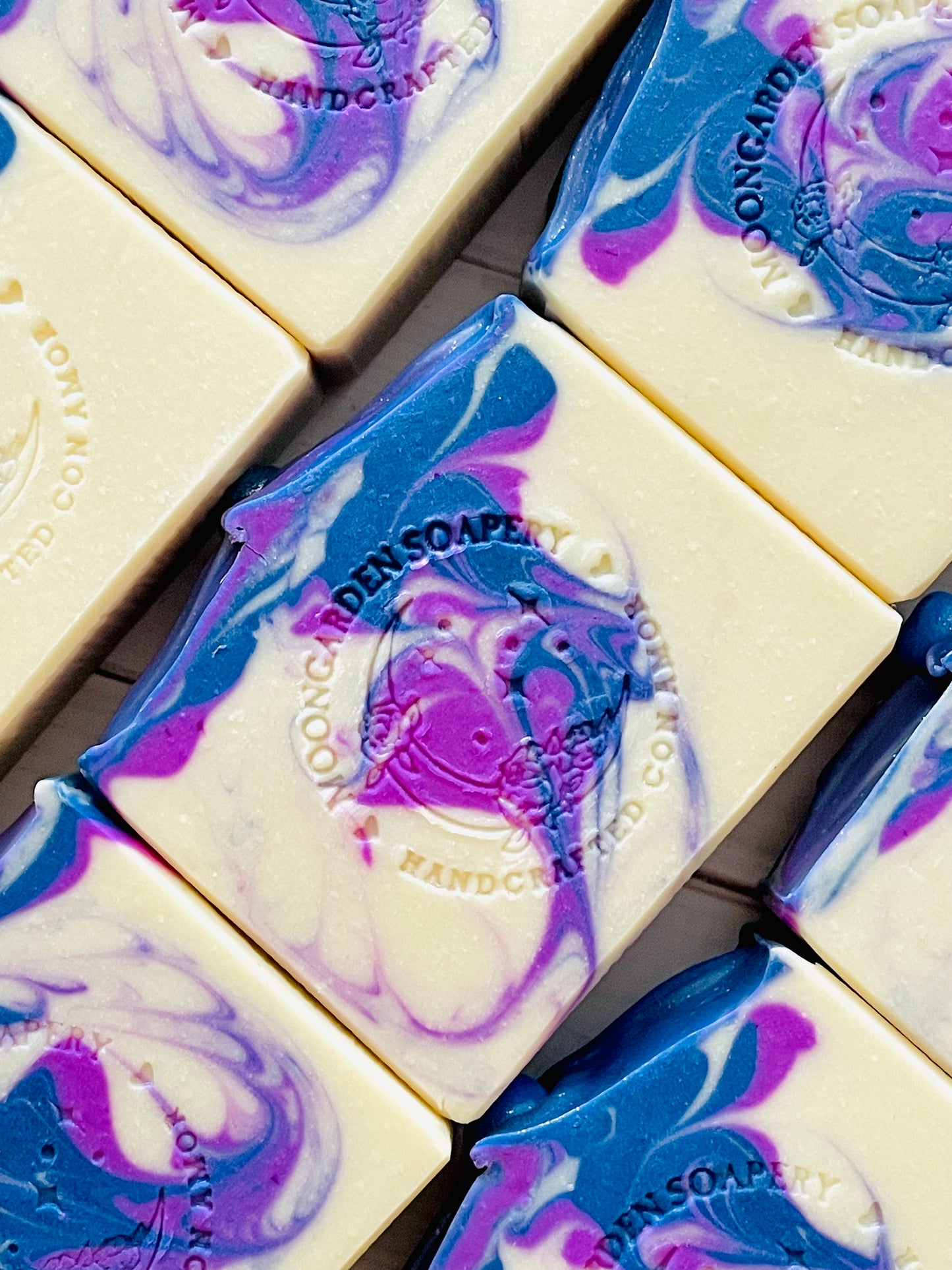 A closeup of Violet Turns Violet bar soaps. 