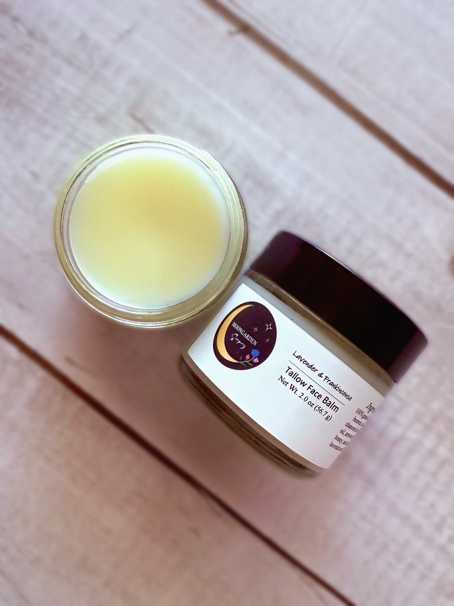 Two jars of tallow face balm. 