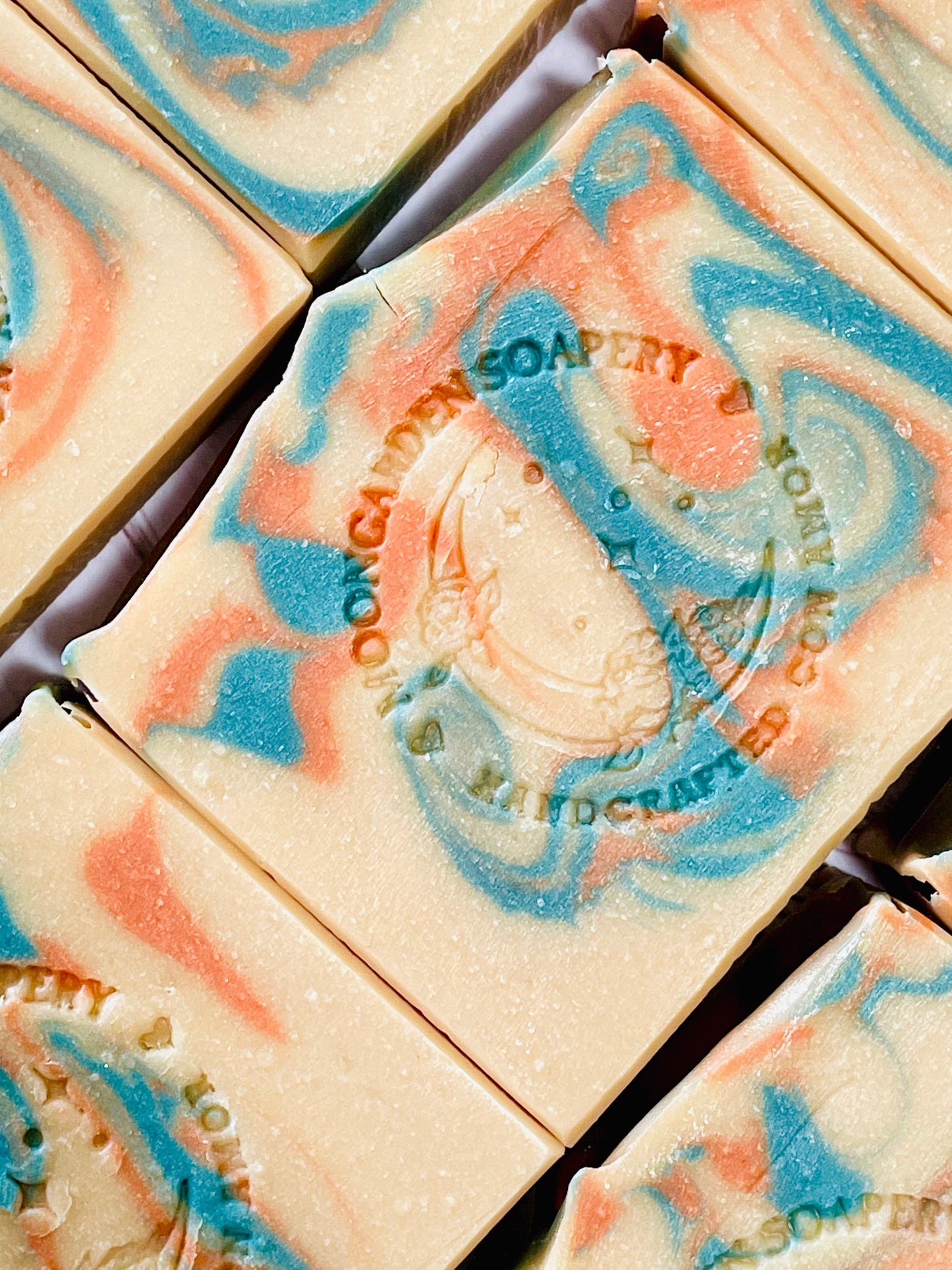 A closeup of some Pure Energy oakmoss and amber bar soaps. 