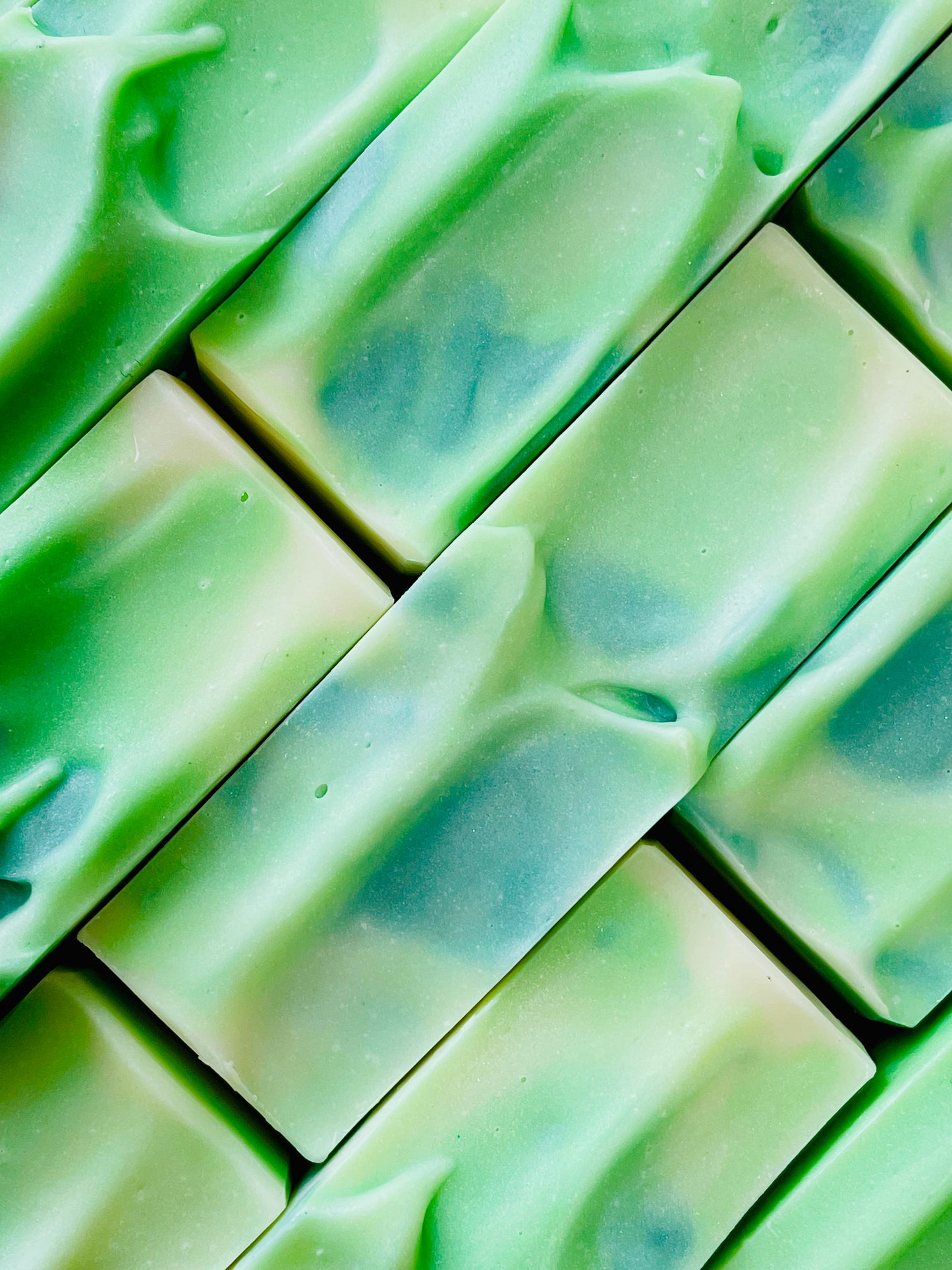 A closeup of the tops of Cool It bar soaps. 