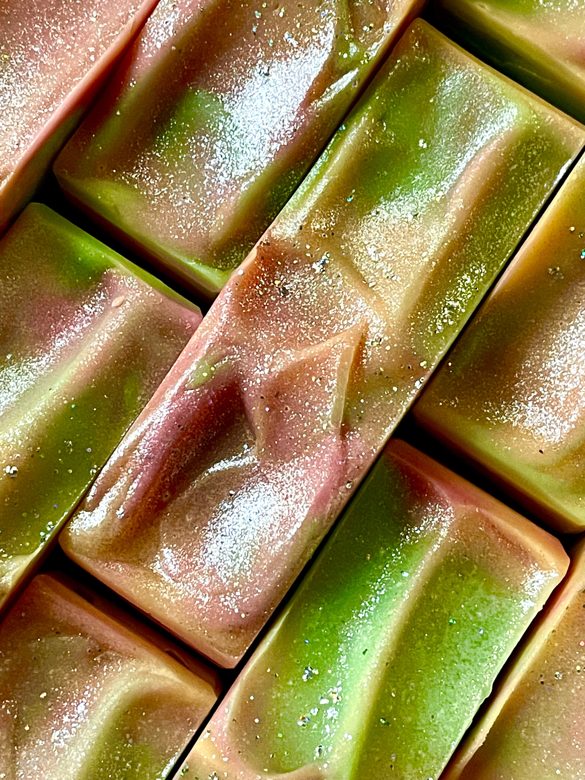 A closeup of the tops of Da Bomb bar soaps. 