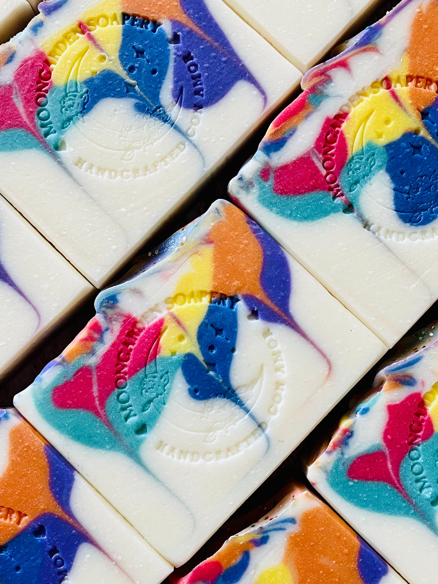 A closeup of some Love Always Wins bar soaps. 